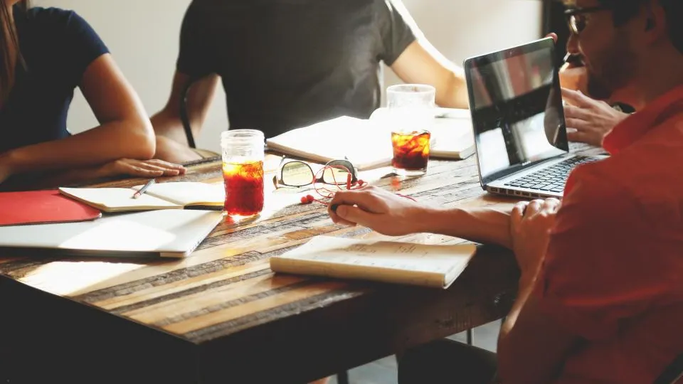 Team reviewing a website project brief together